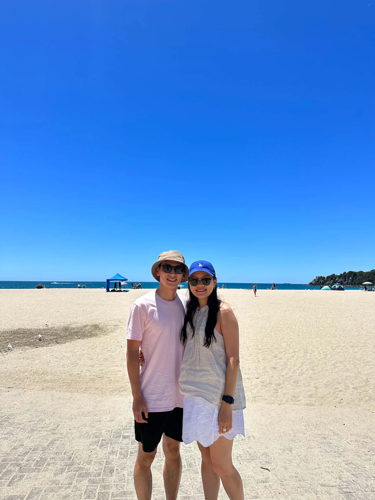 Emily and Benny together on a sunny beach